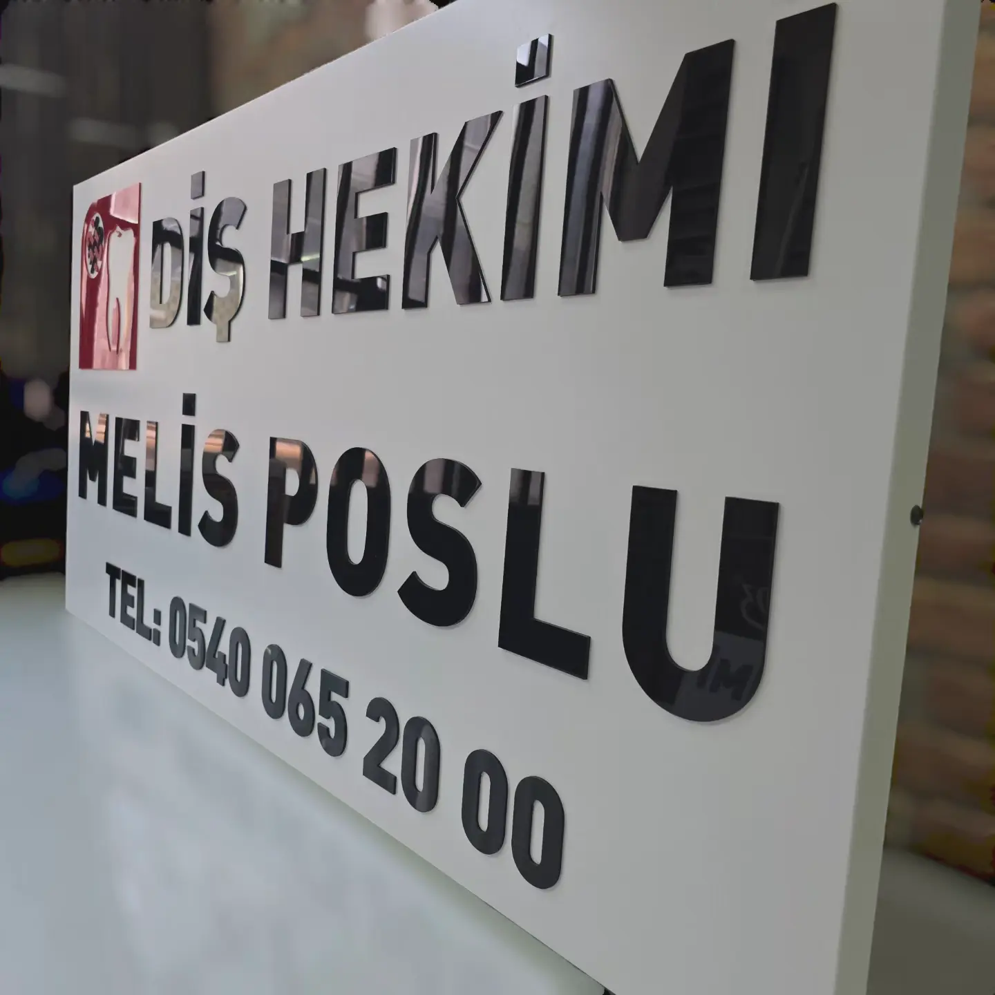 Diş hekimi tabelası örneği