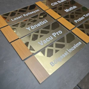 a group of gold and silver signs